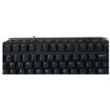 Czarna klawiatura z widocznymi klawiszami funkcyjnymi od F1 do F12 oraz standardowym układem QWERTY. Na klawiszach znajdują się symbole takie jak @, #, &, *, a także klawisze Backspace i Enter.