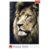 Na zdjęciu znajduje się pudełko puzzli z wizerunkiem lwa, z widocznym logo "Trefl" w prawym górnym rogu. Na dole widnieje napis "Puzzle 1500" oraz "Premium Quality".