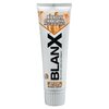 Na zdjęciu znajduje się tubka pasty do zębów z napisem "BLANX" oraz informacjami: "INTENSIVE STAIN REMOVAL with 100% NATURAL BAMBOO", "DARK STAINS SMOKE + COFFEE + TEA", "Non-abrasive whitening toothpaste".
