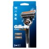 Na zdjęciu znajduje się opakowanie golarki z napisem "Gillette ProGlide" oraz grafiką przedstawiającą golarkę i dwa dodatkowe ostrza. Na opakowaniu widoczne są także ikony symbolizujące cechy produktu oraz liczba "5" w kontekście ostrzy.