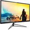 Monitor o przekątnej 31,5 cala wyświetla kolorową grafikę z futurystycznym krajobrazem, pojazdem terenowym i postacią w zbroi. Na dolnej ramce widoczne jest logo "PHILIPS" oraz napis "Momentum 326M".