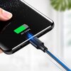 Na zdjęciu widać czarny kabel USB-C podłączony do smartfona, na ekranie którego wyświetla się wskaźnik ładowania z napisem "85% Charging". Na wtyczce kabla widoczny jest napis "UGREEN".
