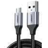 Na zdjęciu widoczny jest szary kabel USB z końcówkami USB i Micro USB, z plecionym oplotem. Na obu końcówkach znajduje się napis "UGREEN".