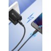Czarny kabel USB - Micro USB UGREEN US289 1 m jest podłączony do smartfona i ładowarki w gniazdku, z widocznym logo "UGREEN" oraz napisem "Quick Charge 3.0". Obok kabla i telefonu znajdują się niebieskie symbole błyskawic, sugerujące szybkie ładowanie.