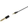 Na zdjęciu widoczne są dwa złącza audio: jedno to wtyk jack 3,5 mm z czarnym kablem, a drugie to adapter jack 6,3 mm, oba z pozłacanymi końcówkami. Tło jest białe, a elementy są dobrze oświetlone.