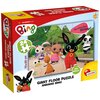 Pudełko puzzli przedstawia kolorową ilustrację z postaciami z bajki, a na opakowaniu widnieje napis "Bing" oraz "24", "70 x 50 cm", "Giant Floor Puzzle", "Andiamo Bing!", "High Quality". Logo producenta to "LISCIANI".