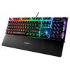 Klawiatura mechaniczna z podświetleniem RGB, posiadająca klawisze numeryczne oraz dodatkowe przyciski funkcyjne, z widocznym logo "steelseries" na podpórce na nadgarstki. Na klawiaturze widoczny jest napis "SETTINGS".