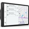 Ekran nawigacji pokazuje listę trzech lokalizacji: "1. Outbound Dock, ABC Fulfillment Center, 0.3 mi NW", "2. Inbound Dock, ABC Fulfillment Center, 0.3 mi NW", "3. Inbound Dock, ABC Fulfillment Center, 0.4 mi N", oraz mapę z zaznaczonymi ulicami i punktami docelowymi. Na obudowie urządzenia widoczny jest napis "GARMIN".