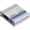 Srebrny router z napisem "TELTONIKA Networks TRB245" oraz informacjami: "Made in Lithuania", "Default IP: 192.168.1.1", "User: admin/admin01", "Power: 9-30 V". Widoczne są złącza Ethernet i inne porty, a także oznaczenia CE i EAC.