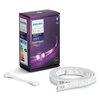 Na zdjęciu znajduje się opakowanie produktu "Przedłużenie taśmy LED PHILIPS HUE 929002269201 1 m Bluetooth" oraz rozwinięta taśma LED z białym przewodem. Na opakowaniu widnieje logo PHILIPS, informacje o produkcie oraz oznaczenie efektywności energetyczne