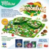 Na zdjęciu znajduje się kolorowa plansza do gry z motywem grzybobrania, otoczona ilustracjami grzybów i ślimaka, z napisem "Rodzina Treflików Grzybobranie". Widoczny jest tekst: "Zapowiada się piękny dzień! Zapraszamy na grzybobranie z Rodziną Treflików. 