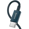 Zdjęcie przedstawia niebieski kabel USB z końcówką typu C, na której widnieje napis "Baseus". Kabel jest lekko zgięty, a jego powierzchnia ma matowe wykończenie.