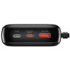 Czarny powerbank z trzema portami: IP/IN, Type-C/OUT/IN, USB/OUT, z widocznymi oznaczeniami nad każdym portem. Po prawej stronie znajduje się podłączony kabel.