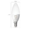 Zdjęcie przedstawia inteligentną żarówkę LED PHILIPS HUE White and Color Ambiance o mocy 4W z gwintem E14, z widocznymi wymiarami: wysokość 117 mm i średnica 39 mm. Na żarówce znajduje się napis "PHILIPS hue white and color".