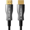 Na zdjęciu widoczne są dwa złącza kabla HDMI z metalicznymi końcówkami, na których znajdują się napisy: "Display Claro" oraz "8K HDMI". Oba złącza mają złote styki i czarne obudowy z białymi strzałkami wskazującymi kierunek.