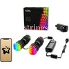 Na zdjęciu znajduje się zestaw lampek choinkowych LED z pudełkiem oznaczonym napisem "twinkly generation II 250 app controlled RGB LED strings", dwie wiązki kolorowych lampek, czarny kontroler oraz zasilacz. Obok widoczny jest smartfon z ikoną gwiazdy na 