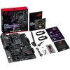 Na zdjęciu znajduje się płyta główna z serii ASUS ROG Strix B550-F Gaming Wi-Fi II wraz z opakowaniem, instrukcją, płytą CD, anteną, kablami i dodatkowymi akcesoriami. Widoczne są również elementy graficzne i logo ROG na opakowaniu oraz na samej płycie gł