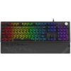 Na zdjęciu znajduje się klawiatura z podświetleniem RGB, z widocznymi klawiszami oznaczonymi literami, cyframi i symbolami. Na klawiaturze widoczny jest napis "KRUX", a na podpórce dla nadgarstków znajduje się wzór geometryczny oraz napis "KRUX".