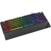 Na zdjęciu znajduje się klawiatura z podświetleniem RGB, z widocznymi kolorowymi klawiszami w odcieniach czerwieni, żółci, zieleni, niebieskiego i fioletu. Na klawiaturze widoczny jest napis "KRUX" oraz dodatkowe przyciski i pokrętło w prawym górnym rogu.
