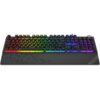 Czarna klawiatura mechaniczna z podświetleniem RGB, z widocznymi kolorowymi klawiszami w odcieniach czerwieni, żółci, zieleni, niebieskiego i fioletu. Na dolnej części klawiatury znajduje się logo "KRUX".