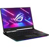 Laptop z otwartym ekranem wyświetlającym kolorową grafikę z napisem "FOR THOSE WHO DARE" oraz logo ROG. Klawiatura jest podświetlana, a na obudowie widoczny jest napis "ROG STRIX".
