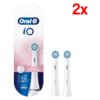 Opakowanie zawiera dwie białe końcówki do szczoteczki z niebieskimi i białymi włóknami, obok widoczny jest napis "Oral-B iO SANFTE REINIGUNG". W prawym górnym rogu znajduje się czerwony napis "2x".