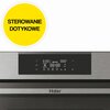 Na zdjęciu widoczny jest panel sterowania kuchenki mikrofalowej z wyświetlaczem cyfrowym, na którym znajdują się różne ikony i cyfry, takie jak "8.8.8 W", "888°C" oraz "88:88". W lewym górnym rogu zdjęcia znajduje się żółte koło z czarnym napisem "STEROWA