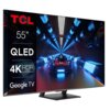 Telewizor z wyświetlaczem pokazującym dynamiczną scenę z samochodem w futurystycznym tunelu oświetlonym niebieskimi światłami. Po lewej stronie ekranu widnieją napisy: "TCL", "55\"", "QLED", "4K HDR PRO", "Google TV".