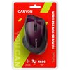 Opakowanie przedstawia purpurową mysz bezprzewodową z napisem "CANYON" na jej powierzchni. Na czerwonym tle widnieją napisy: "WIRELESS MOUSE MW-01", "Blue energy saving sensor", "3 mln Clicks", "1600 Adjustable DPI" oraz "Superior optical sensor & blue LE