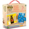 Pudełko puzzli z napisem "INTO THE WILD GIANT FLOOR PUZZLE" zawiera 26 dwustronnych elementów, z ilustracjami zwierząt i cyfr. Na opakowaniu widoczne są przykładowe elementy z literą "B" i cyfrą "11", a także logo "shuffle".