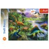 Obrazek przedstawia kolorową ilustrację z dinozaurami w bujnej, zielonej scenerii z rzeką i górami w tle. W lewym górnym rogu znajduje się logo "Trefl" oraz liczba "200" na białym tle w kształcie puzzla, a po lewej stronie pionowy napis "Trefl Puzzle" i o