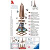 Puzzle 3D RAVENSBURGER Wieża Eiffla 12536 (62 elementy) przedstawiają model wieży Eiffla złożony z plastikowych elementów, z informacjami o zawartości zestawu w kilku językach oraz ilustracjami pokazującymi proces składania. Na dole widnieje logo Ravensbu