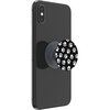 Czarne urządzenie mobilne z zamontowanym uchwytem i podstawką POPSOCKETS, ozdobionym wzorem białych psich łapek na czarnym tle. Na uchwycie widoczny jest napis "POPSOCKETS".