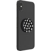 Czarne urządzenie mobilne z zamontowanym uchwytem i podstawką POPSOCKETS, ozdobionym wzorem białych psich łap na czarnym tle. Produkt jest przedstawiony na tle neutralnym, bez widocznych napisów ani logo.