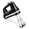 Czarny mikser ręczny z dwoma podwójnymi trzepaczkami, na którym widnieje napis "KitchenAid" oraz "6 SPEED". Mikser ma błyszczące wykończenie i ergonomiczny uchwyt.