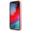 Różowe etui na telefon z kolekcji Peony Collection marki Guess, zaprojektowane dla modelu iPhone 12 Pro Max. Na ekranie telefonu widoczna jest godzina 9:41 oraz data "Tuesday, August 7", a także ikony latarki i aparatu.