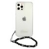 Przezroczyste etui na telefon z widocznym logo "Guess" na dole, przeznaczone dla modelu Apple iPhone 12 Pro Max. Obok etui znajduje się czarny pasek z koralikami i metalowymi zdobieniami.