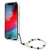Przezroczyste etui na telefon z widocznym złotym napisem "Guess" na dole. Do etui dołączony jest biały sznurek z koralikami i ozdobnymi elementami.