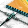 Na zdjęciu widoczny jest czarny kabel USB-C podłączony do smartfona leżącego na marmurowej powierzchni. Na ekranie telefonu znajduje się ikona odcisku palca oraz wskaźnik baterii z liczbą "1252".