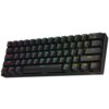 Czarna klawiatura mechaniczna z podświetleniem RGB, posiadająca klawisze z oznaczeniami w różnych kolorach, w tym "Esc", "Tab", "CapsLk", "Shift", "Ctrl", "Alt", "Fn", "Win", oraz numery od 1 do 0. Na klawiaturze widoczne jest logo smoka.