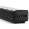 Czarny soundbar z widocznymi przyciskami na bocznej ściance: włączania, przełączania źródła oraz regulacji głośności. Na obudowie znajduje się logo "Dolby Atmos".