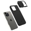 Czarne etui do telefonu z widocznym okrągłym wycięciem na aparat oraz miejscem na MagSafe. Obok etui znajdują się dodatkowe elementy: okrągły pierścień, mały prostokątny element oraz prostokątna wkładka z napisem "MagSafe Compatible Designed by Spigen Inc