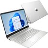 Srebrny laptop z otwartym ekranem, na którym widoczny jest interfejs systemu Windows 11 z ikonami aplikacji. Na obudowie laptopa znajduje się logo producenta.