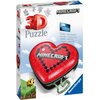 Opakowanie przedstawia produkt "Puzzle 3D RAVENSBURGER Minecraft Serce 11285 (60 elementów)" z grafiką czerwonego serca z pikselowym wzorem i napisem "MINECRAFT". Na opakowaniu widnieje logo "Ravensburger" oraz informacja o technologii "EASYCLICK", a takż