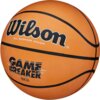 Pomarańczowa piłka koszykowa z czarnymi liniami, na której widnieje napis "Wilson All Surface Cover" oraz "Game Breaker 28.5". Powierzchnia piłki ma teksturę z małymi wypustkami.
