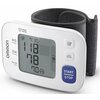 Cyfrowy ciśnieniomierz z wyświetlaczem pokazującym wartości: SYS 118 mmHg, DIA 78 mmHg, PULSE 70/min, z przyciskami oznaczonymi ikonami oraz napisem "START/STOP". Widoczne logo "OMRON" oraz "Intelli sense".