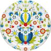 Okrągła zakrętka ozdobiona kolorowym, ludowym wzorem z motywami kwiatowymi w odcieniach niebieskiego, czerwonego, zielonego i żółtego na białym tle. Wzór składa się z różnych stylizowanych kwiatów i liści, tworząc symetryczną kompozycję.