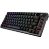 Na zdjęciu znajduje się klawiatura mechaniczna z podświetleniem RGB, posiadająca klawisze funkcyjne oznaczone od F1 do F12 oraz dodatkowy wyświetlacz z logo ROG. Klawisze są w kolorze czarnym, a ich podświetlenie mieni się różnymi kolorami.