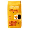 Żółte opakowanie kawy ziarnistej z napisem "EDUSCHO - Coffee heritage since 1924 Family" oraz "Invigorating & Strong" i "INTENSITY" z pięcioma czerwonymi kropkami. Na dole widnieje napis "CLASSIC COFFEE" oraz grafika filiżanki z kawą.