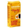 Żółte opakowanie kawy ziarnistej z napisem "EDUSCHO Coffee heritage since 1924 Family" oraz "CLASSIC COFFEE" w kolorze czerwonym. Na opakowaniu widoczne są również słowa "Invigorating & Strong" oraz "INTENSITY" z graficzną reprezentacją intensywności w postaci kropek.